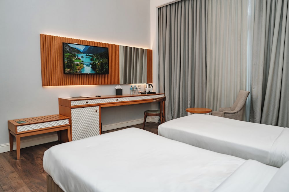 غرفة ديلوكس بسريرين منفصلين بغرفة نوم واحدة، Promenade Hotel 5/8