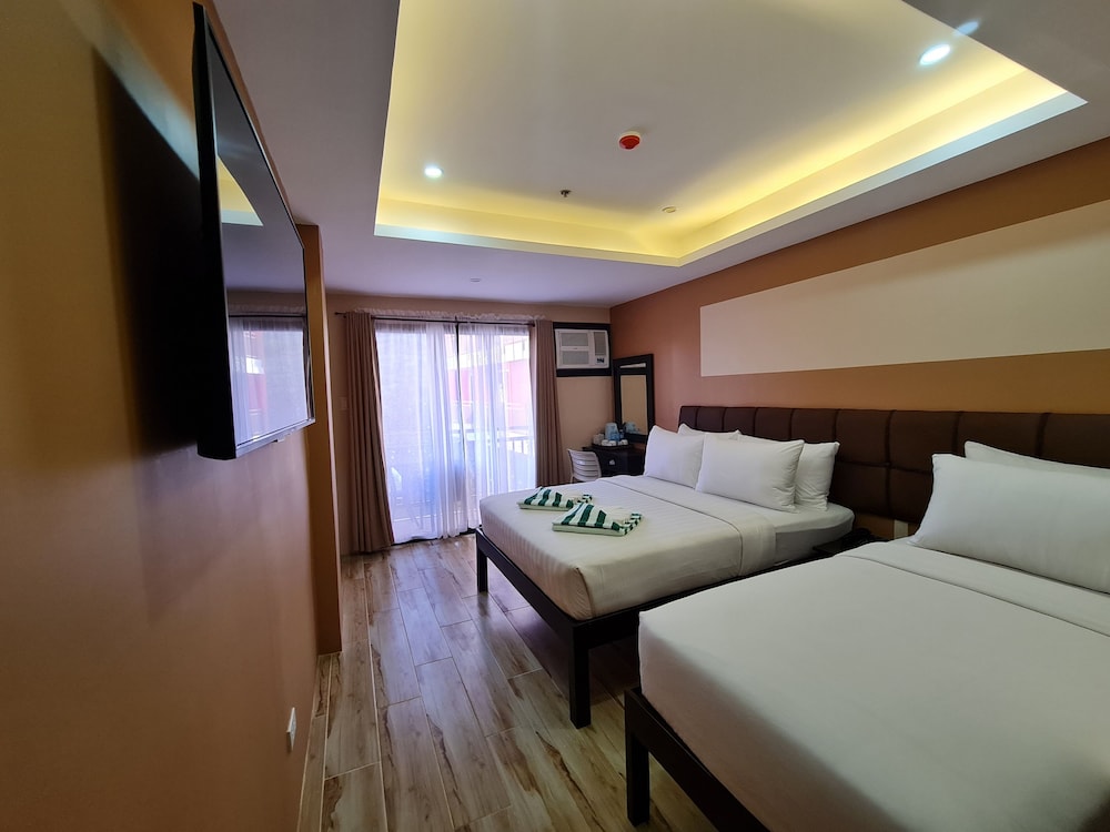 غرفة سوبيريور بسرير كوين وسرير فردي، Red Coco Inn de Boracay 2/3