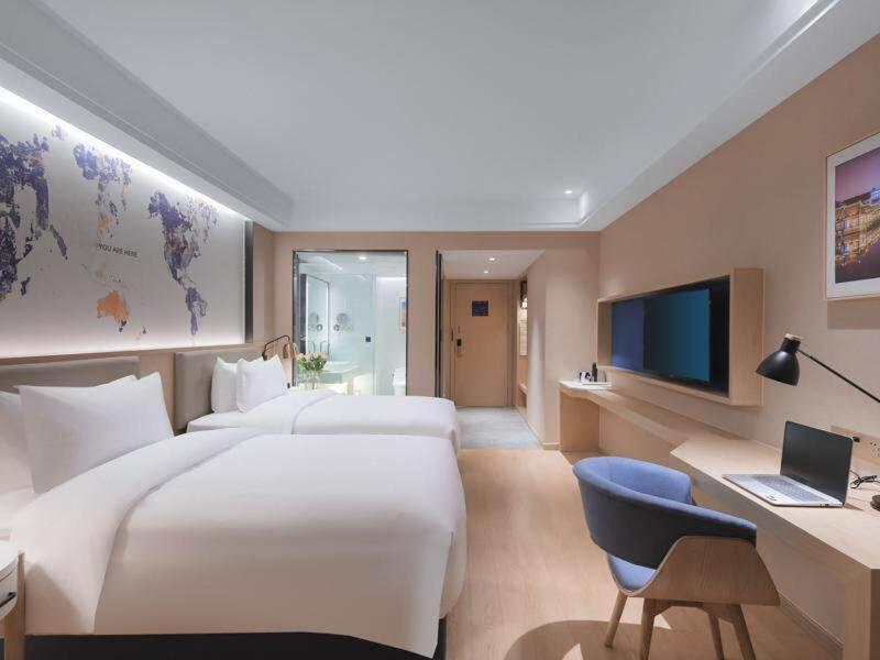 Kyriad Marvelous Hotel (Suzhou Wujiang People's Square) 12/29