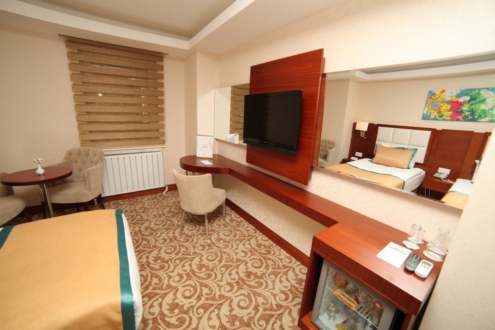 ASRIN BUSINESS HOTEL 51/73