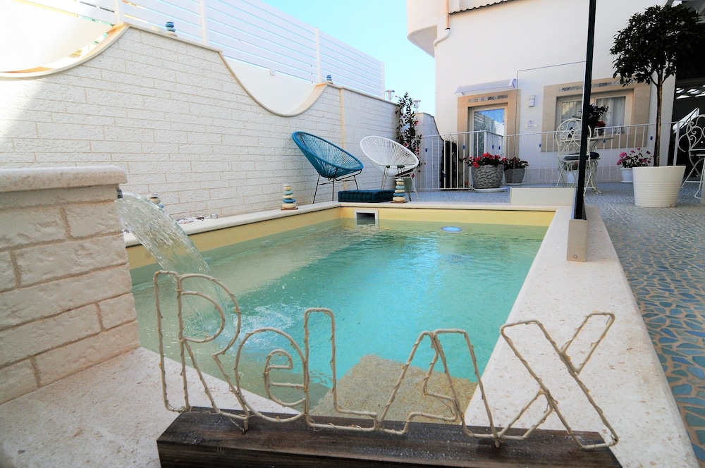 Quattrocuori Room & Relax 65/69