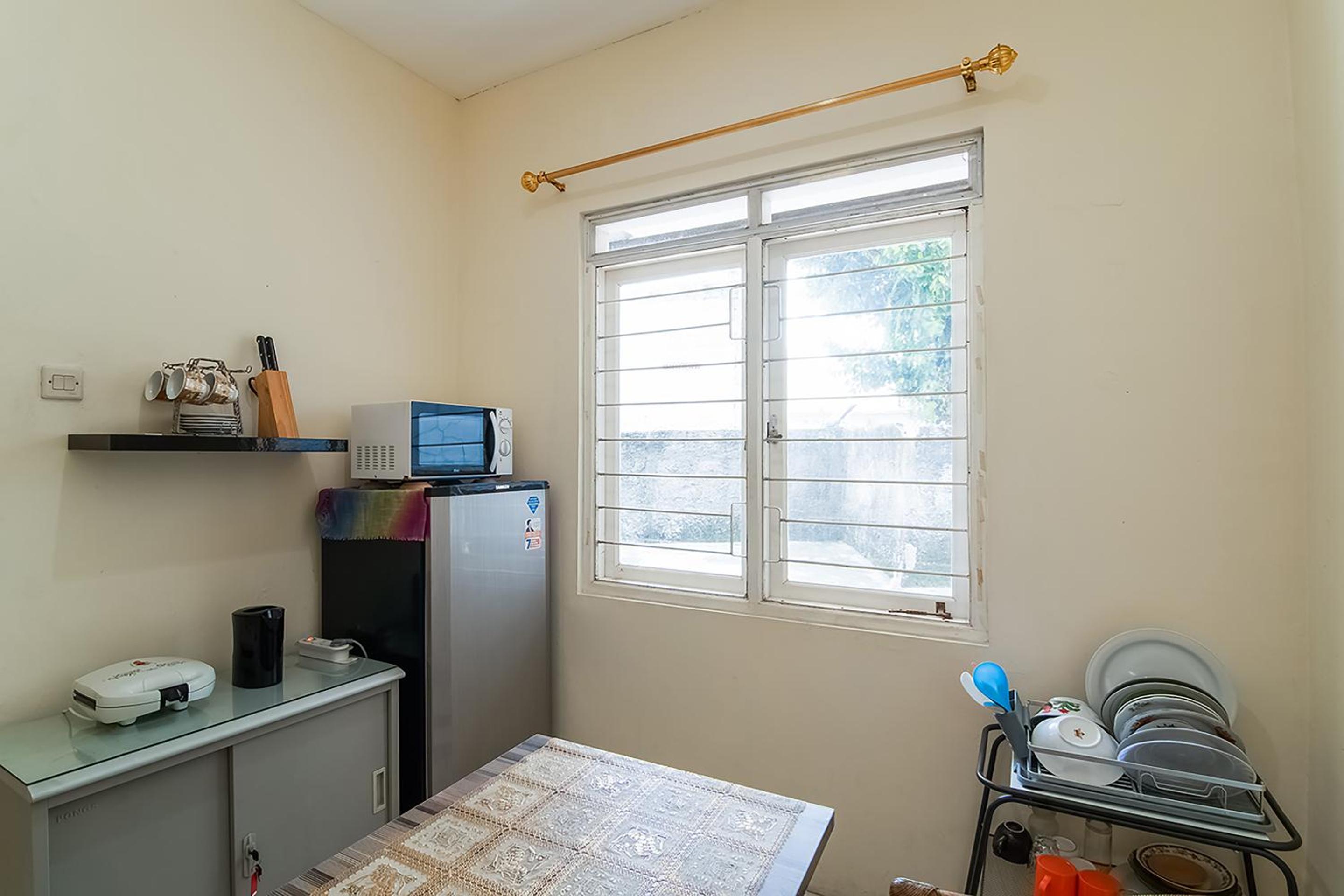 SPOT ON 3988 Kost Carmelia Baranangsiang Syariah 35/45