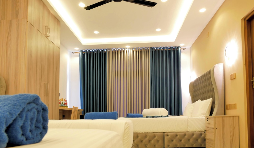 غرفة ملكية رباعية بسرير كينج، Nine Arch Holiday Resort 7/10