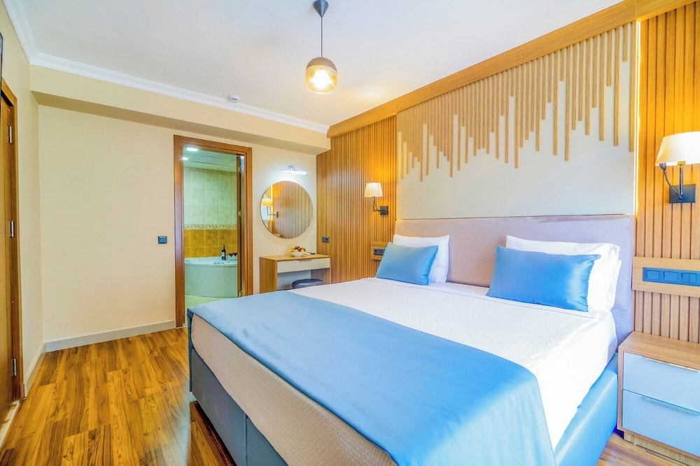 جناح بسرير مزدوج وسريرين منفصلين بإطلالة على البحيرة، Dalyan Tezcan Hotel 9/10