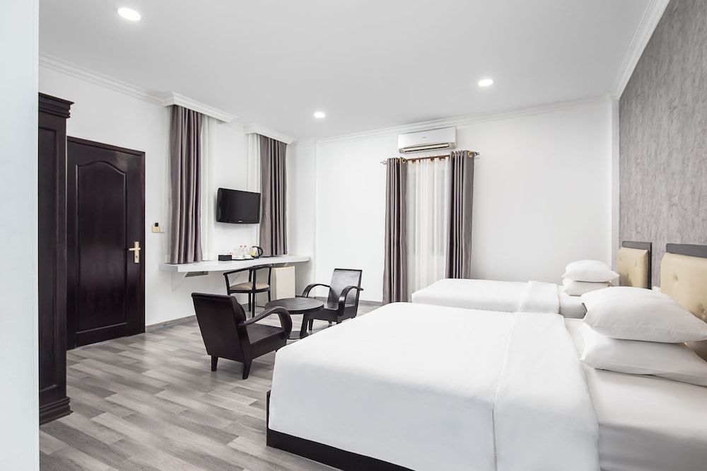 غرفة أساسية ثلاثية بسريرين كوين، KING GRAND BOUTIQUE HOTEL 4/9