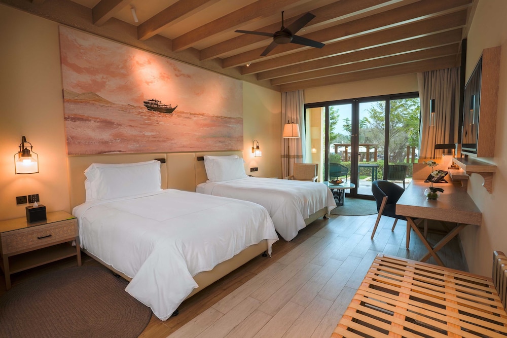 RESORT, TWIN BEDS, BALCONY OR TERRACE