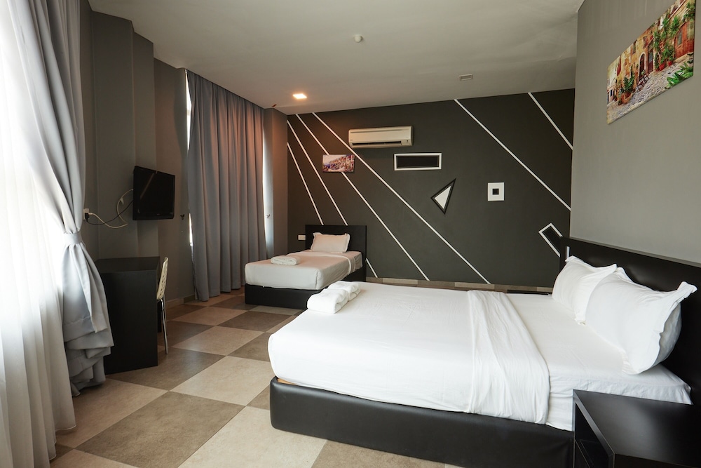 غرفة سوبيريور عائلية بسرير كوين وسرير فردي، Elite Hotel Muar 2/8