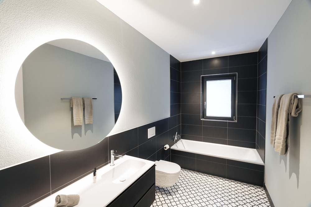 شقة ديلوكس بسريرين كوين بغرفتي نوم مع أريكة، Andermatt Alpine Apartments 9/9