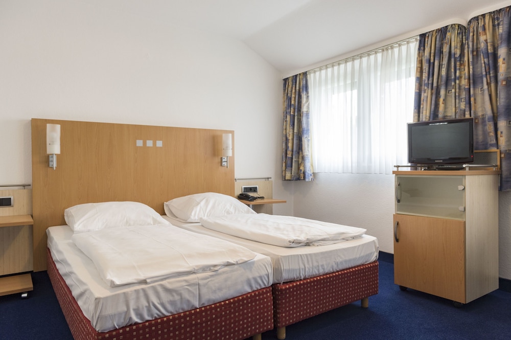 Das Kleine Stadthotel 16/32