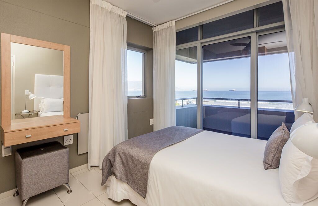 غرفة بسرير كوين بشرفة بغرفتي نوم في الطابق الأرضي، Infinity Self-Catering Apartments 2/5