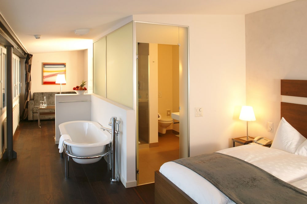 جناح ديلوكس بسرير مزدوج مع أريكة، Hotel Arc En Ciel Gstaad 5/10