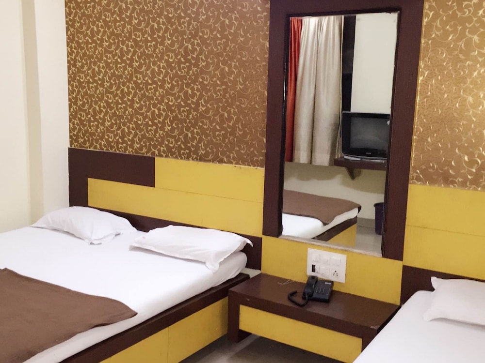 STANDARD, TRIPLE, 1 DOUBLE AND 1 SINGLE BED