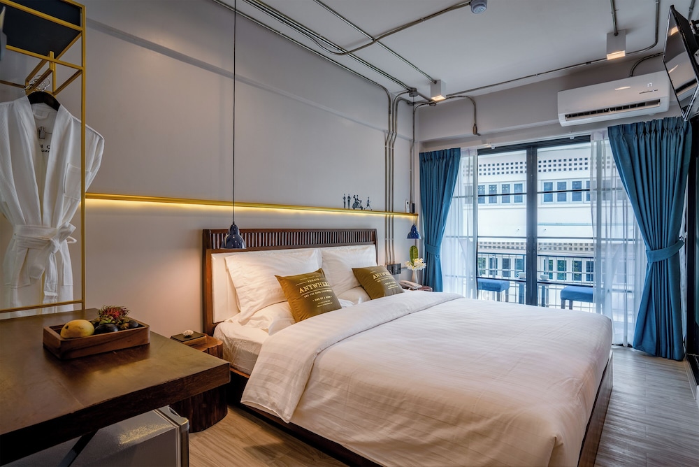 غرفة ديلوكس بسرير كينج بإطلالة على الحديقة بشرفة، Momo Hotel 2/5