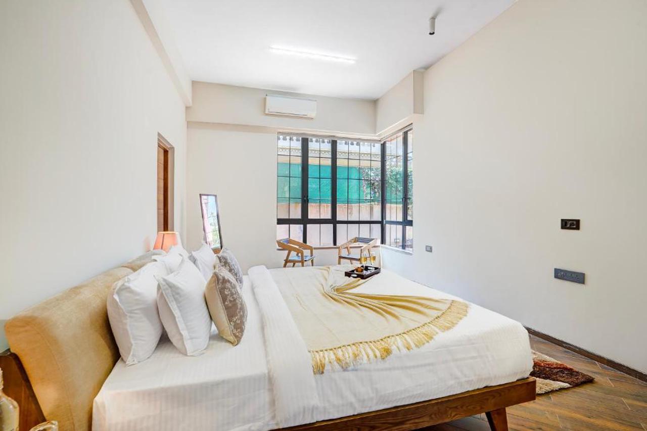 Room at ELIVAAS Villa 39 Serene 6 BHK Retreat with Pvt Pool, Gaming Zone & Balcony, LONAVALA