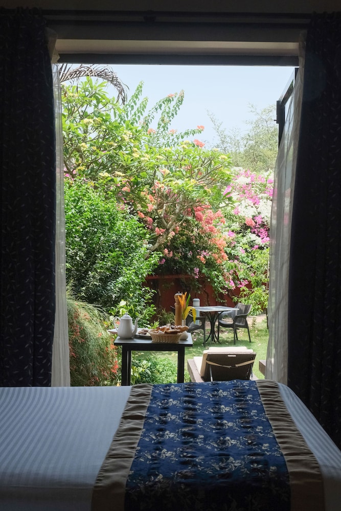 Whispering Palms Beach Resort in CANDOLIM