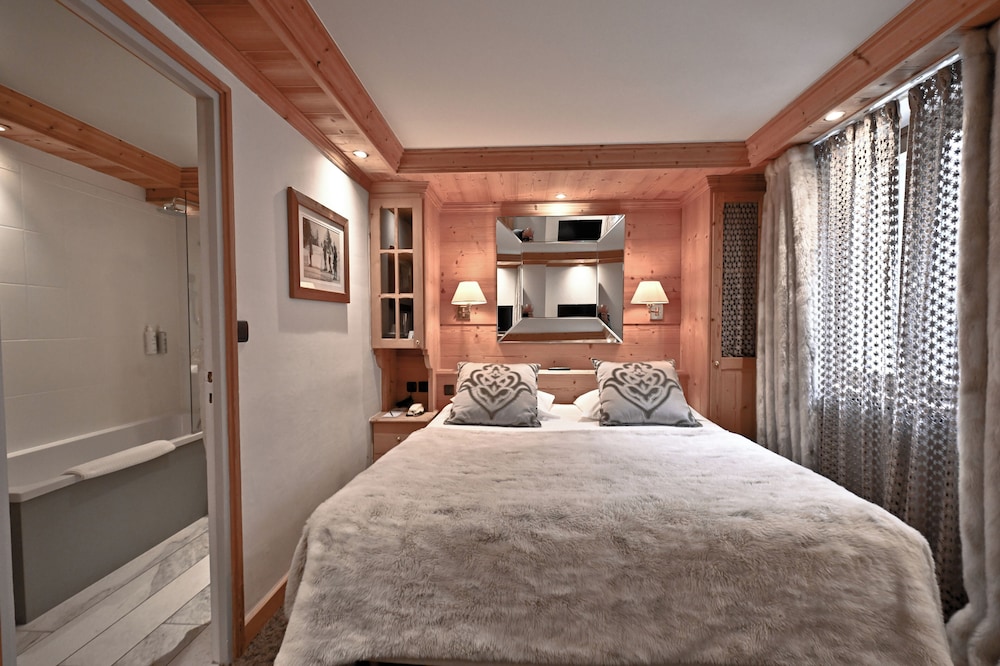 غرفة قياسية بسريرين منفصلين بحوض استحمام، Hôtel Tsanteleina 2/10
