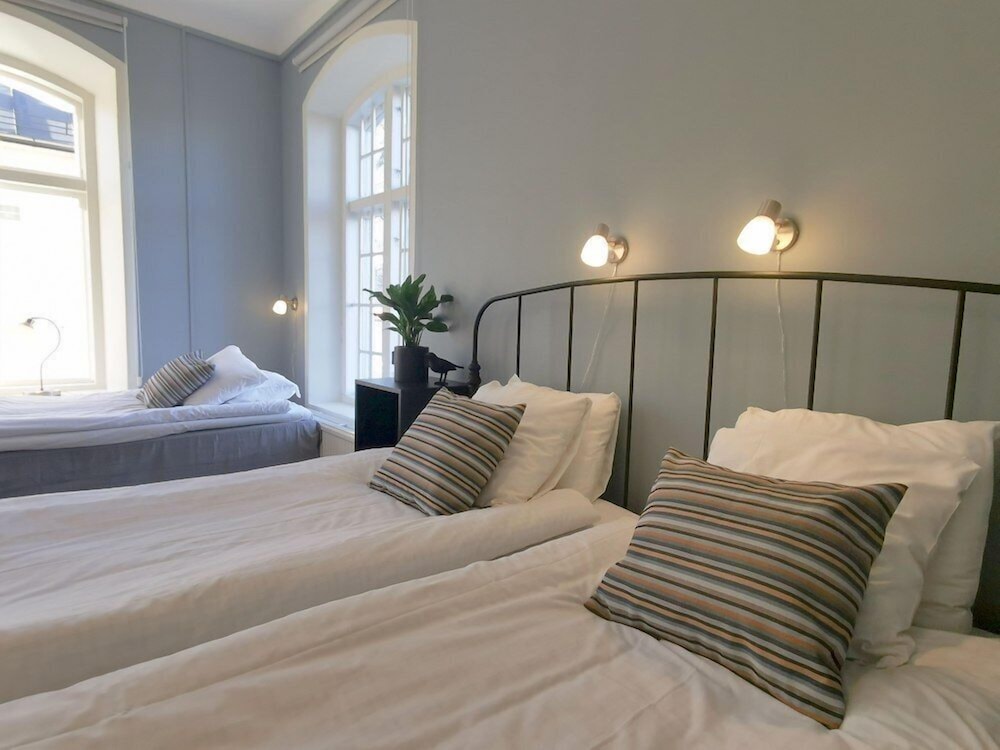 Family, 1 Queen and 3 Single Beds