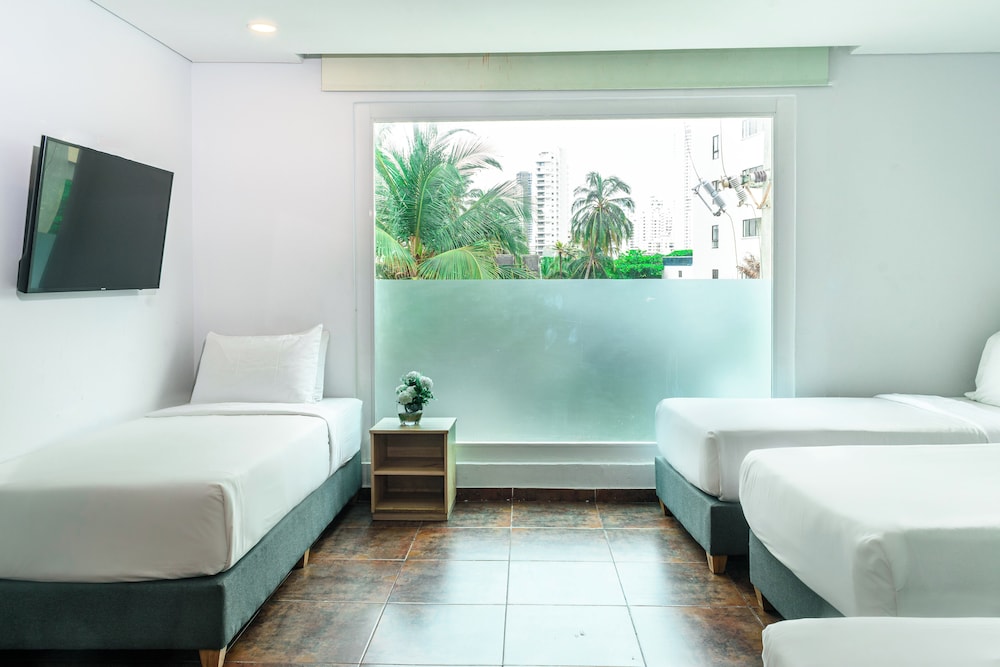 غرفة قياسية رباعية بسريرين كوين بإطلالة على المدينة، Hotel Caribbean Cartagena 7/10