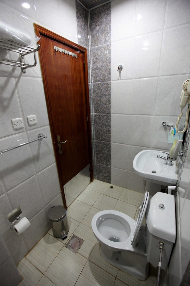 فندق برج العنوان(Enwan Suites Serviced Apartments) 45/47