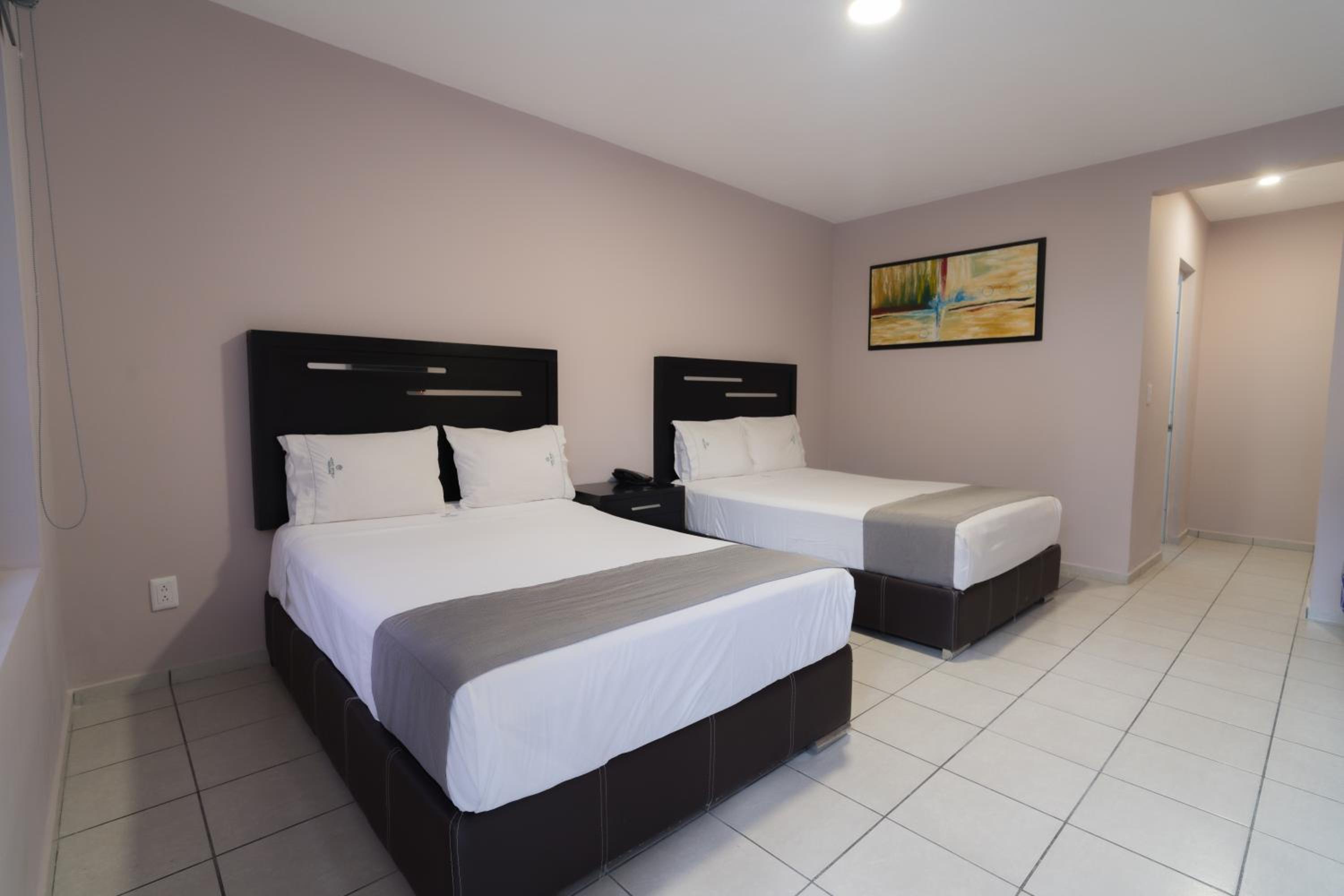 غرفة بسريرين منفصلين، Expo Hotel Guadalajara 3/4