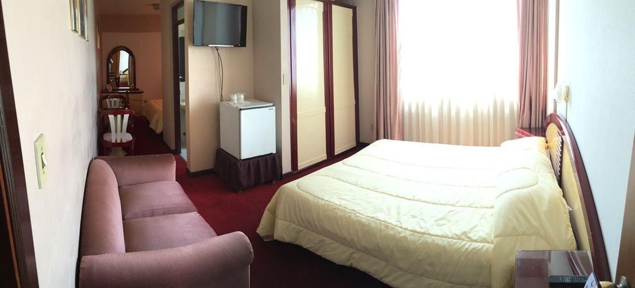 غرفة قياسية رباعية، Americana Hotel 2/3