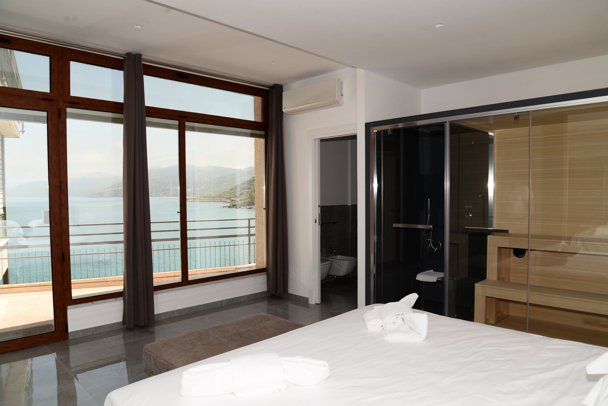 Suite, King Bed, Sea View, 2 Sofa, Sauna