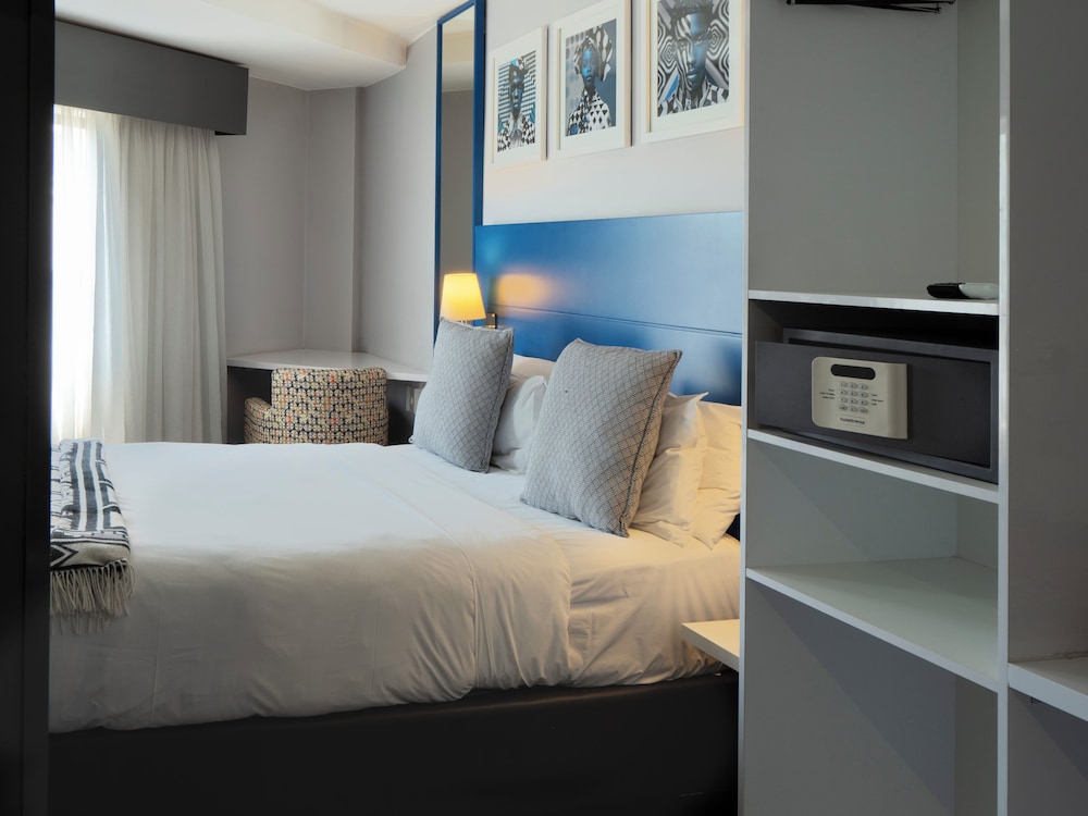 غرفة تنفيذية بسرير كوين، Onomo Johannesburg Sandton Hotel 6/10