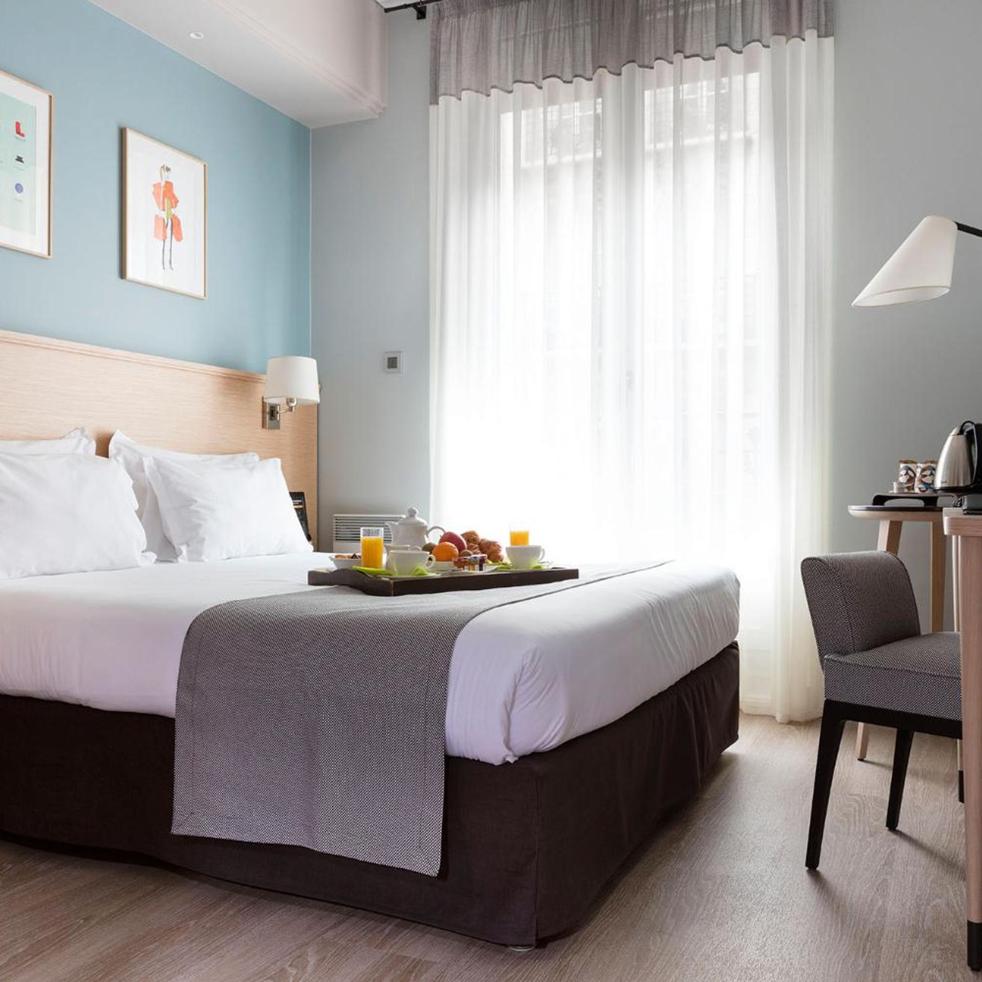 غرفة بسريرين منفصلين بإطلالة على الحديقة، Hotel Magellan 2/6