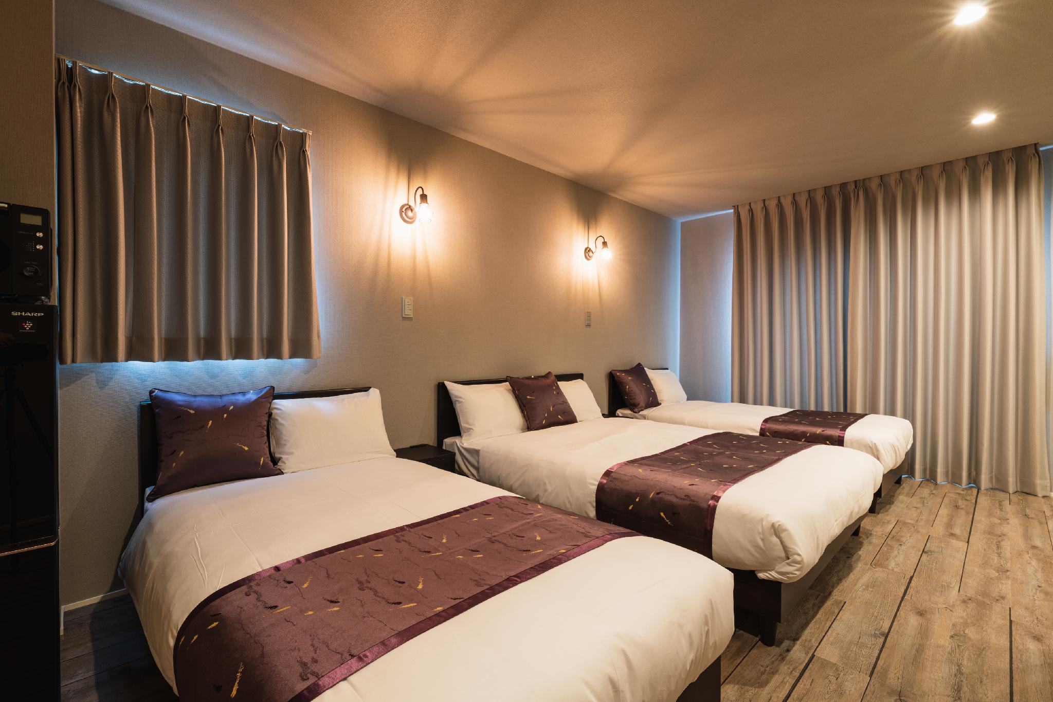 Deluxe, Family, 2 Double and Twin Beds