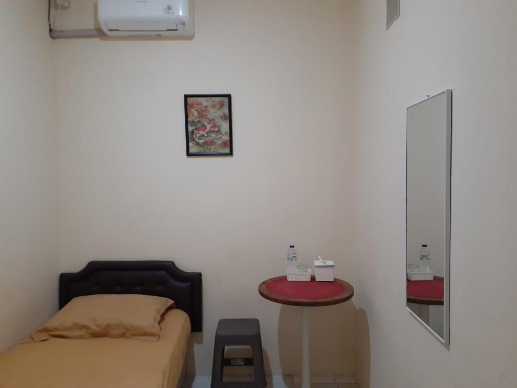 SPOT ON 3988 Kost Carmelia Baranangsiang Syariah 32/45