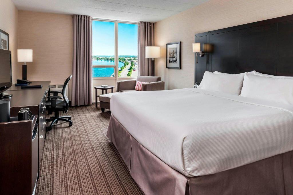 1 Bedroom, Suite, King Bed, Water View, Sofa, Corner