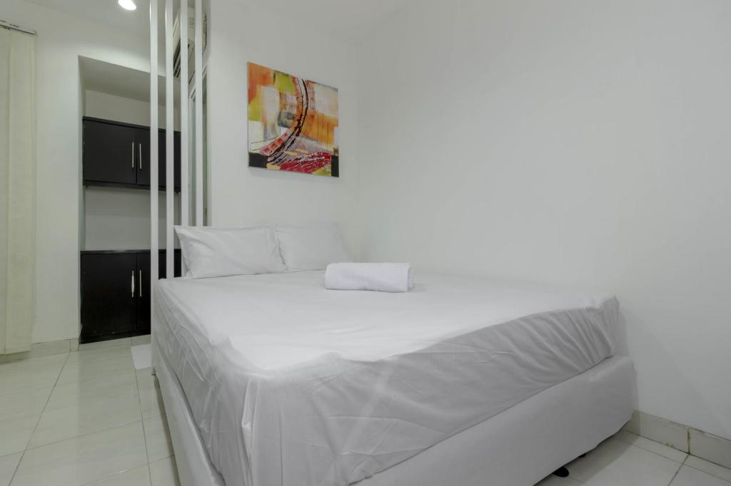 Reddoorz Plus Pasar Baru 13/43