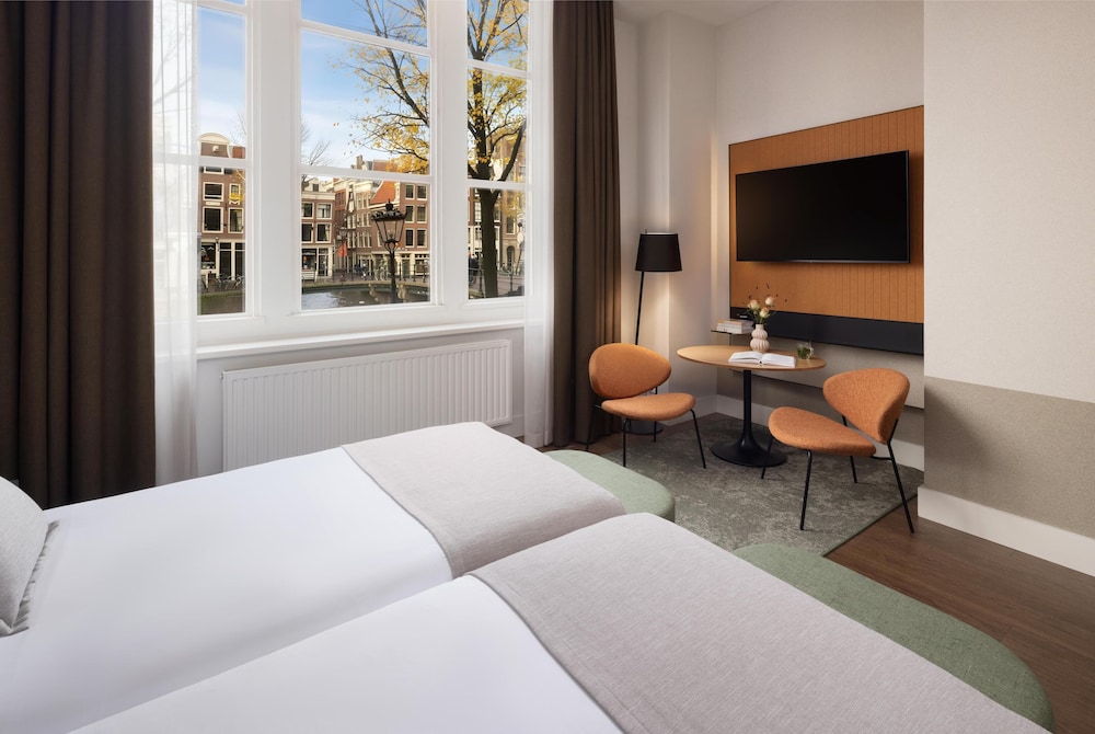 غرفة سوبيريور بسرير كينج بإطلالة على القناة، Nh City Centre Amsterdam 6/9