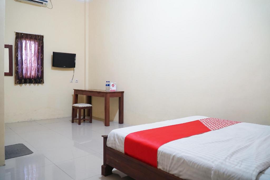 OYO 1034 Pondok Mulia Guest House 22/33