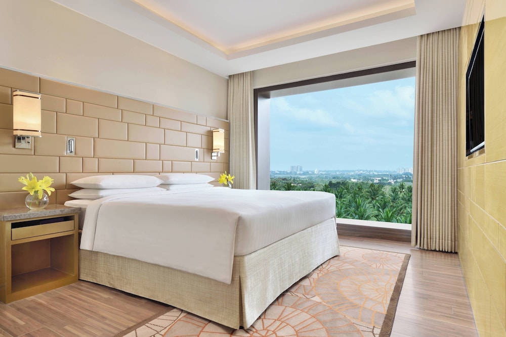 غرفة تنفيذية بسرير كينج، Courtyard Bengaluru Hebbal 3/3
