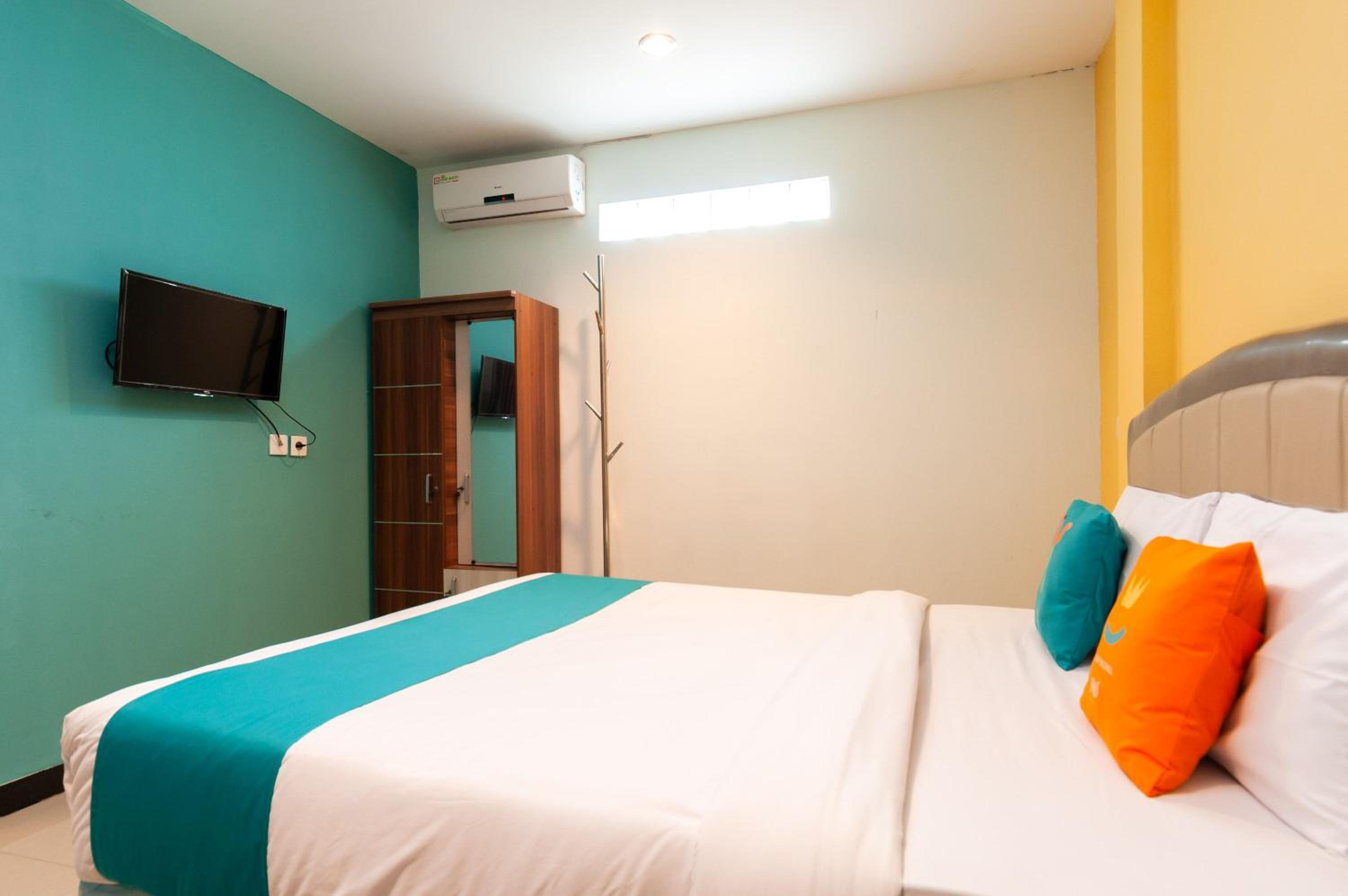 غرفة ديلوكس بسرير مزدوج، Sans Hotel Finest Medan 4/7