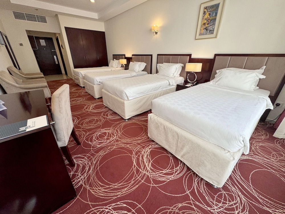 غرفة قياسية رباعية بأربعة أسرّة، ابراج الريان المكية(Al Rayyan Makiya Towers Hotel) 5/9
