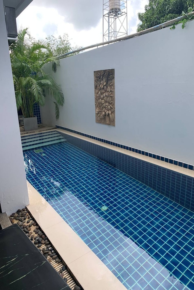 One World One Home Naiharn Hotel by ZUZU 7/50