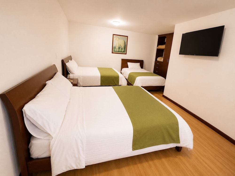 غرفة عائلية بسرير كوين وسريرين كوين، Nogal Suite Hotel Pasto 8/10