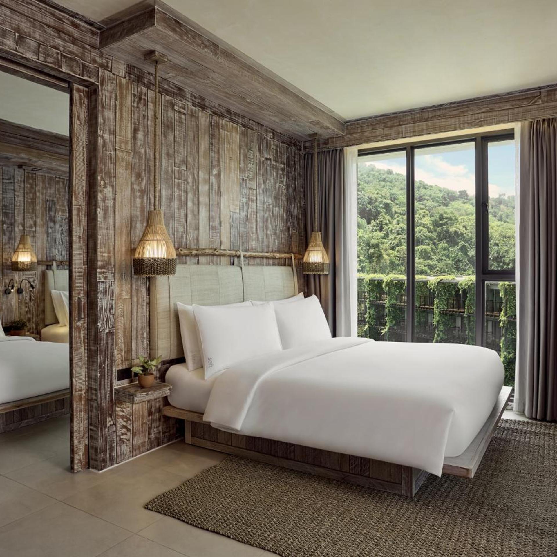 جناح ركني بسرير كينج وسرير فردي بغرفتي نوم، Dinso Resort 3/8