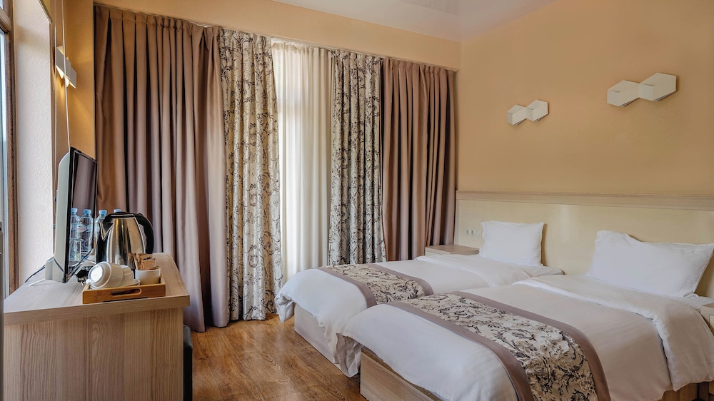 غرفة كلاسيكية بسريرين منفصلين، Gudauri Inn 3/8