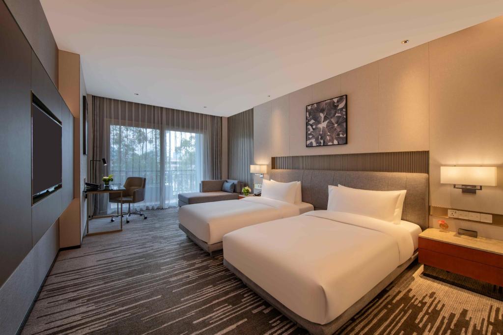 غرفة ديلوكس بسريرين منفصلين بإطلالة على المدينة، Dongguan Forum Hotel and Apartment 4/9