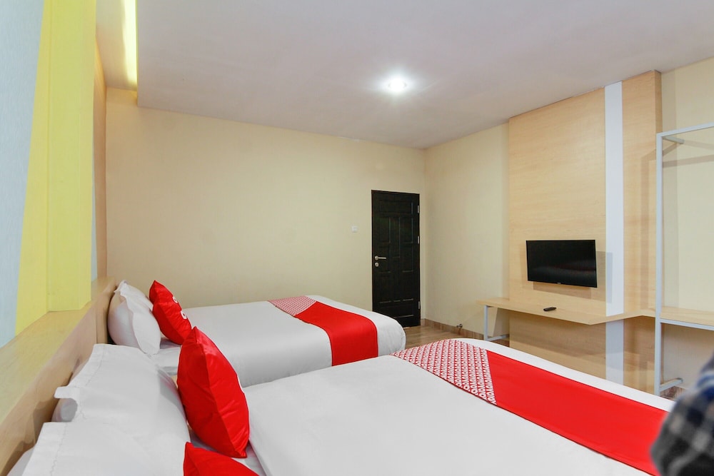 Capital O 3476 Millenium Inn 25/41