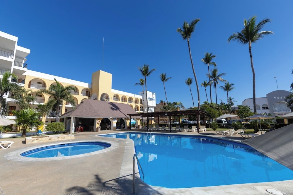 Costa Alegre Hotel And Suites 57/59