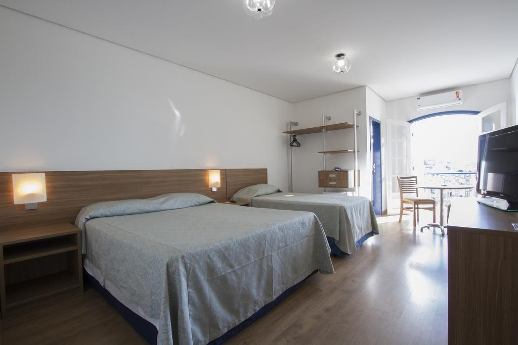 Deluxe, Triple, 1 Double and 1 Single or 3 Single Beds