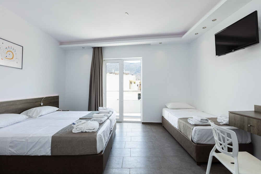 غرفة ثلاثية بسرير مزدوج وسرير فردي، Kahlua Boutique Hotel 2/4