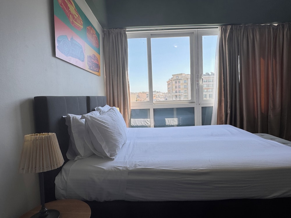 جناح استوديو كومفورت بسرير كوين بإطلالة على المدينة مع أريكة، Connect Suites 2/10
