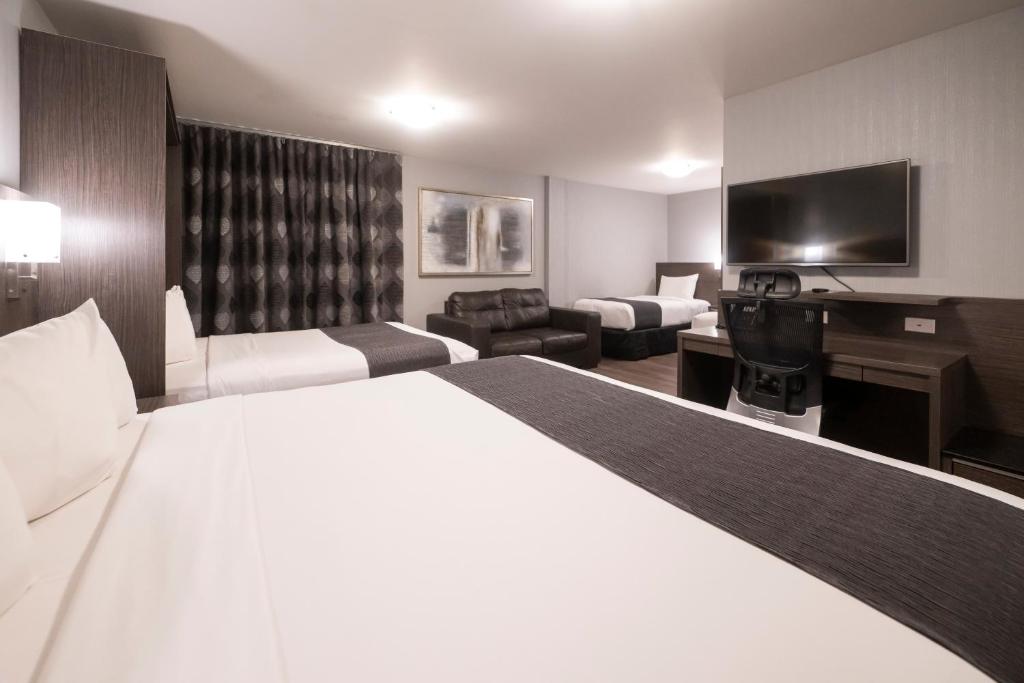 جناح، Hotel & Suites Le Dauphin Quebec 3/8