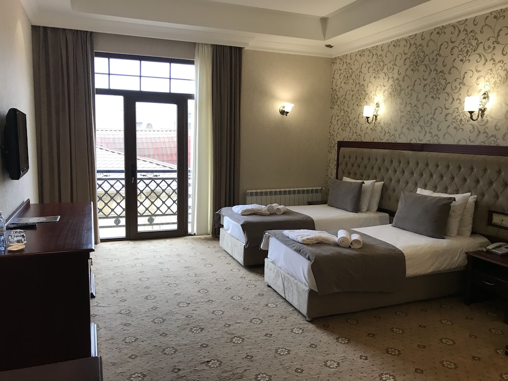 غرفة ديلوكس بسريرين منفصلين، Capitol Hotel 3/6