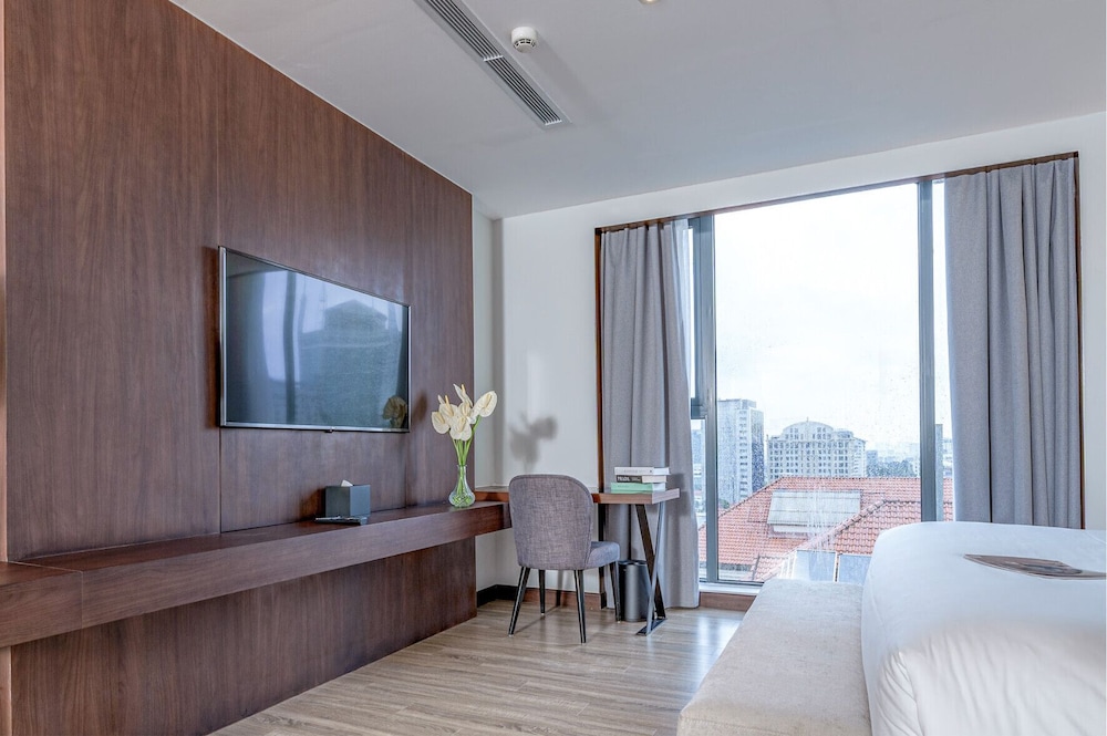 غرفة ديلوكس بسرير كينج، Signature By M Village Le Thanh Ton, a brand of Modern Village Lifestyle 3/4